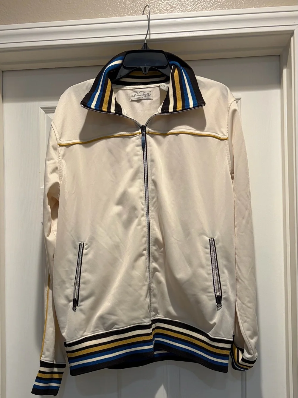 Eighty Eight Cream Track Jacket with Blue, Navy & Gold Stripe Trim